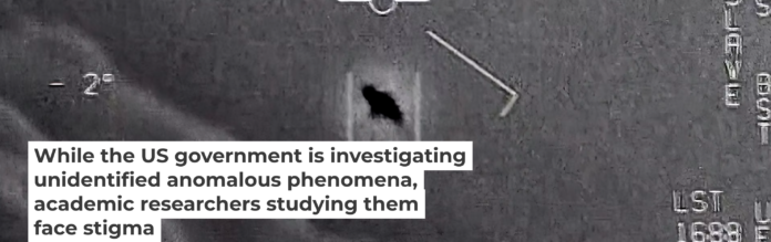 A famous UAP video shows an unexplained object as it soars high along the clouds, traveling against the wind. Department of Defense via AP